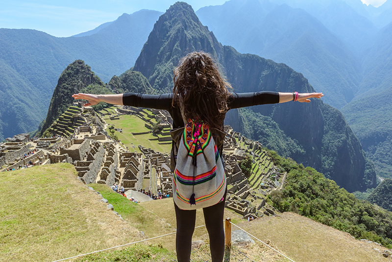 Woman standing at Machu Picchu