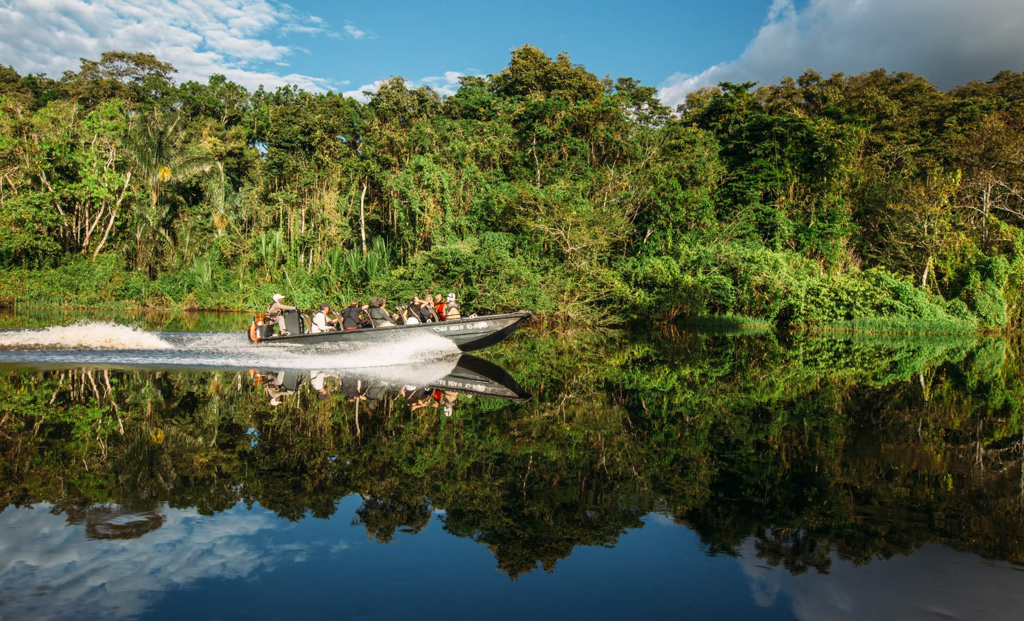 Exploring the Amazon by skiff