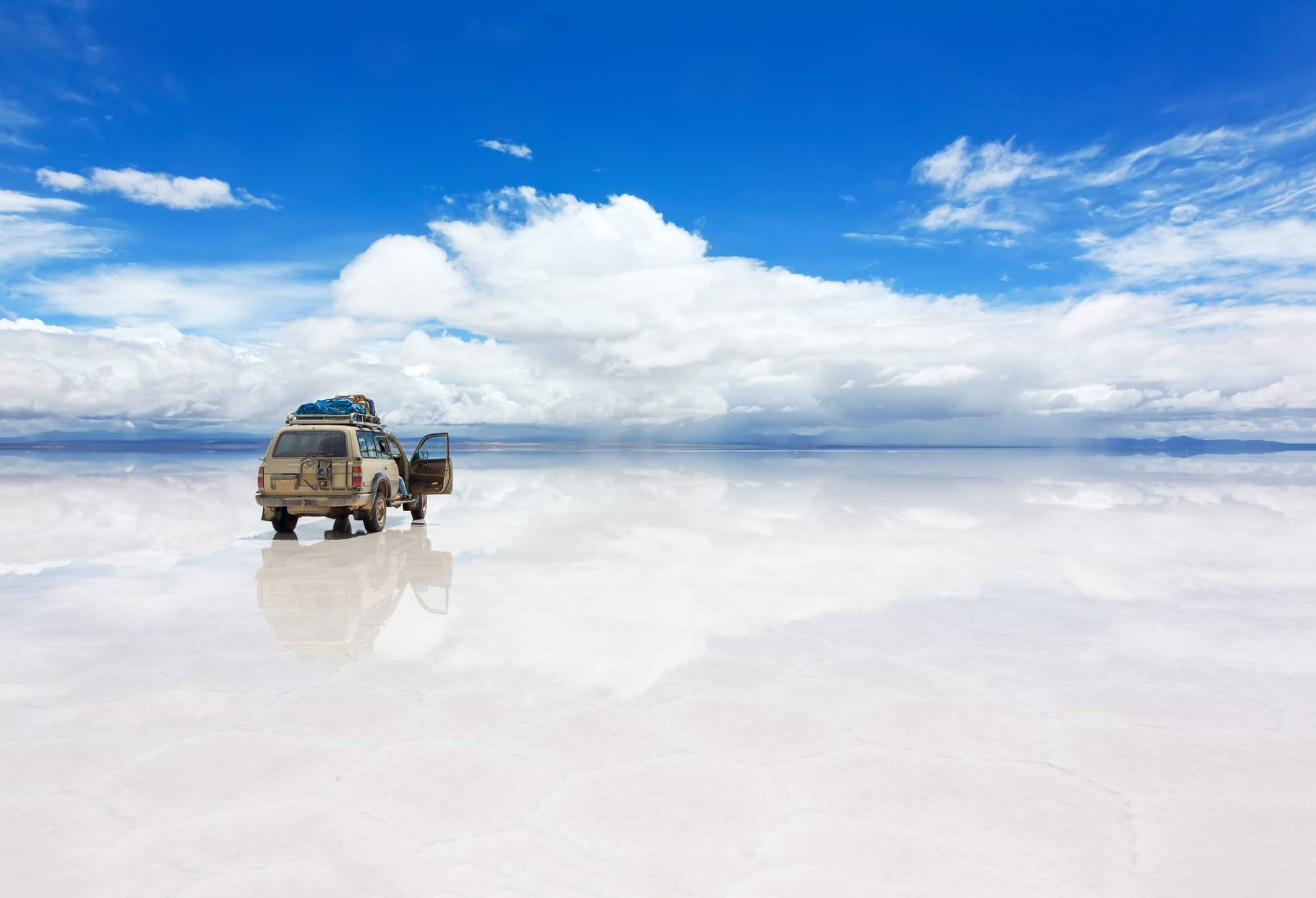 jeep parked on Bolivian salt flat