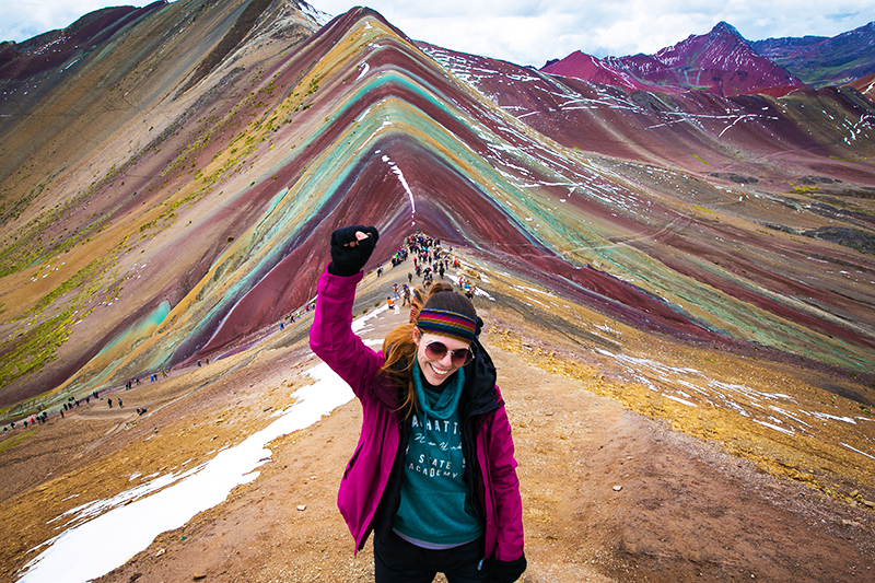 woman celebrates trek at Montana de Siete Colores