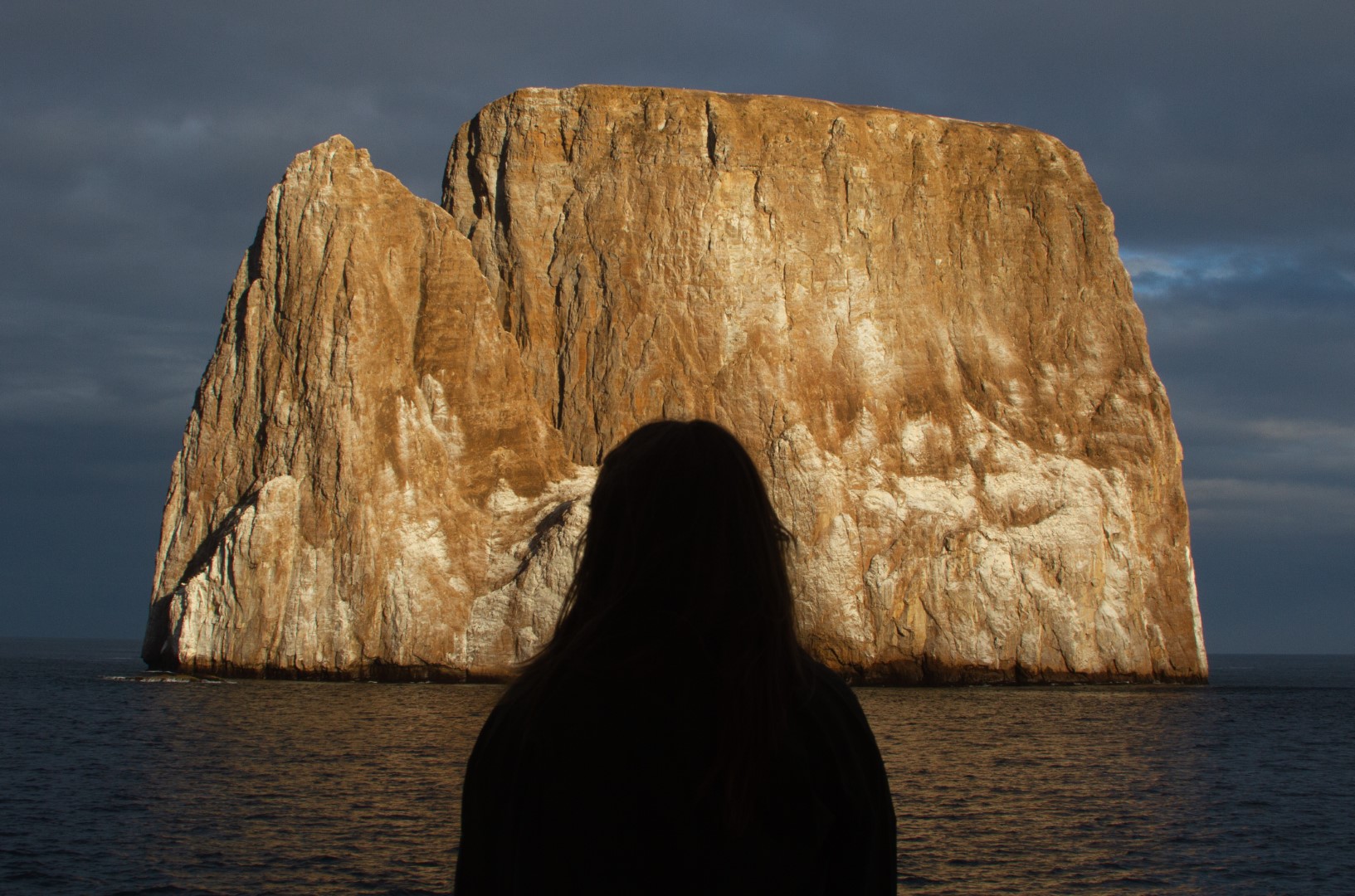 Person looking out at Kicker Rock Galapagos Islands