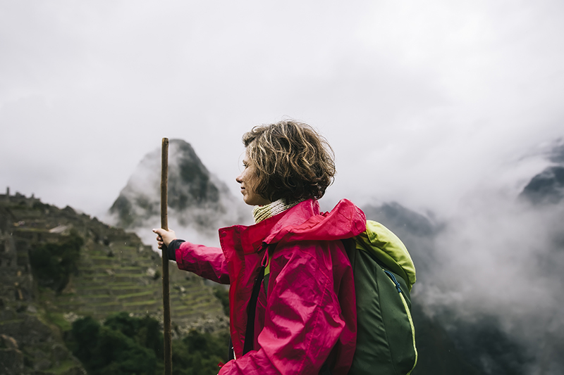 A woman explores Machu Picchu